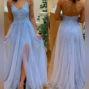 Prom coming dress in pink size 2. Never worn! Slit dress.